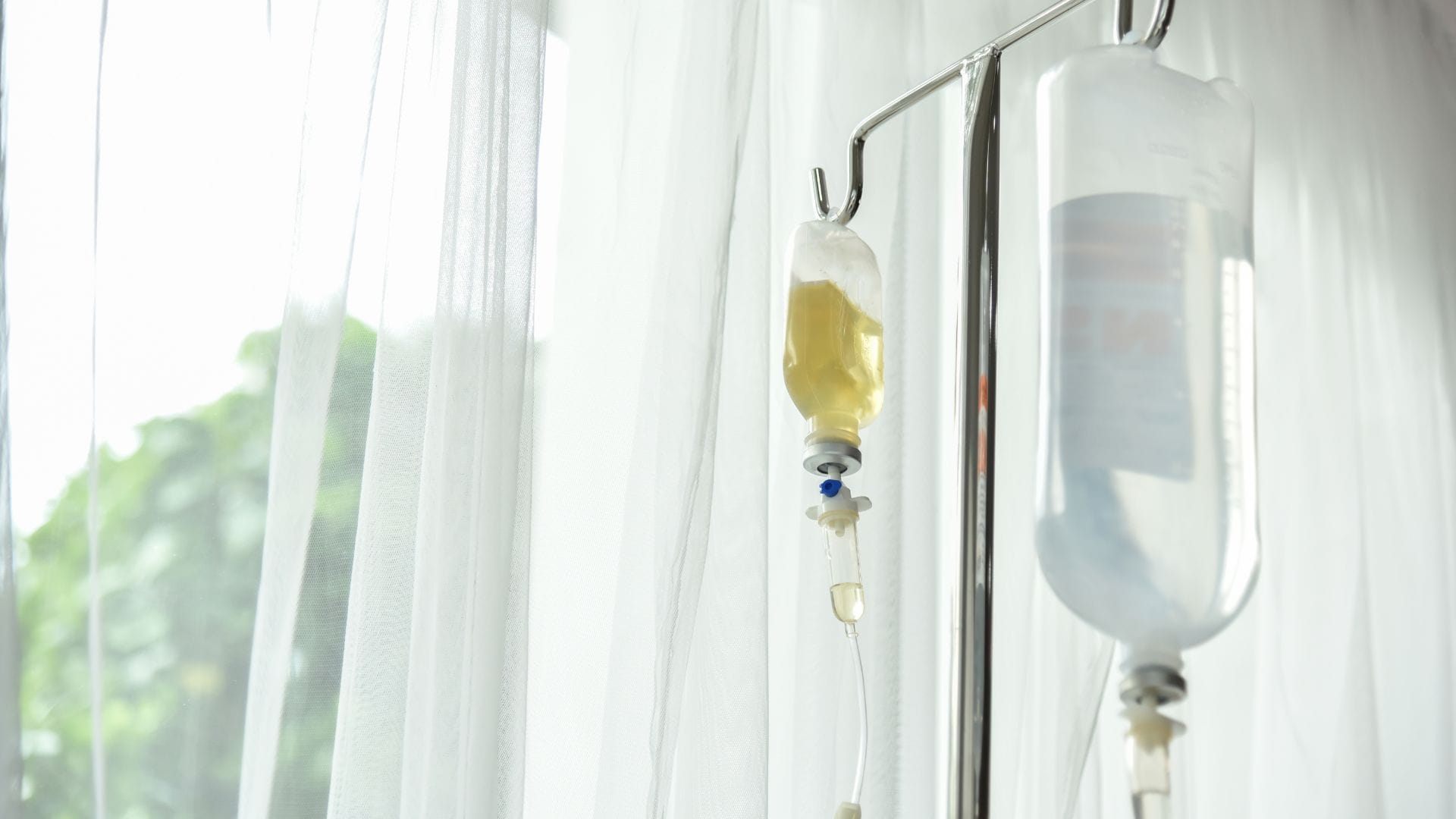 Patient receiving mobile IV therapy at home from a licensed urgent care provider in Phoenix