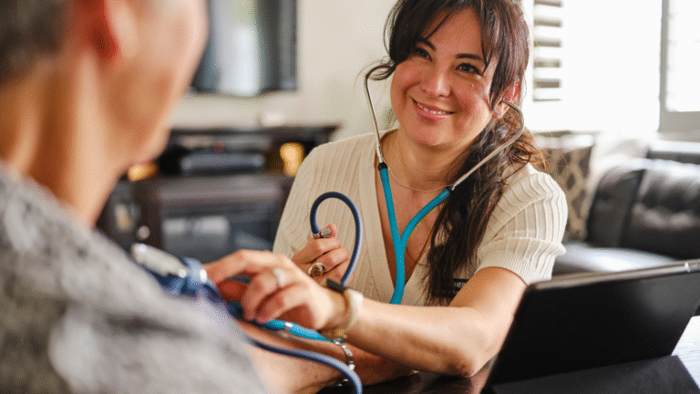 Mobile doctor providing in-home medical care during a house call visit